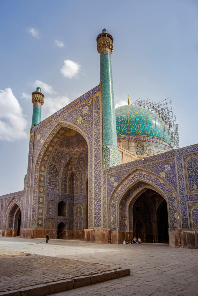 pexels photo 17728052 17728052 Explore the exquisite mosaic tiles and towering minarets of Shah Mosque, Isfahan, under bright sunlight.